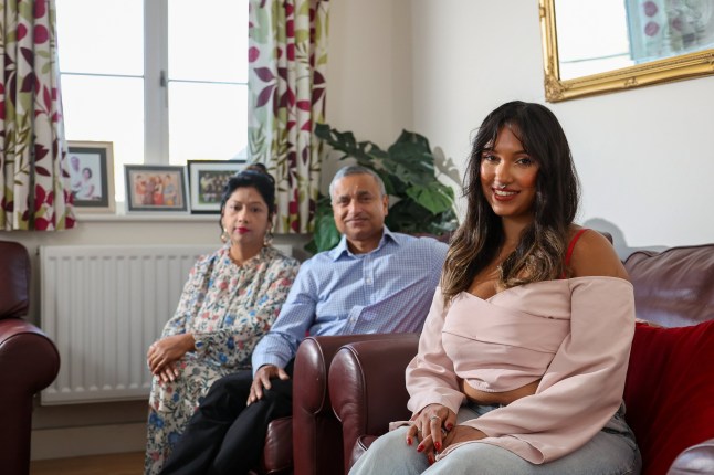 **METRO** Shakila Karim with parents Sultana Parvin and Karim U at home in Ware, Hertfordshire.