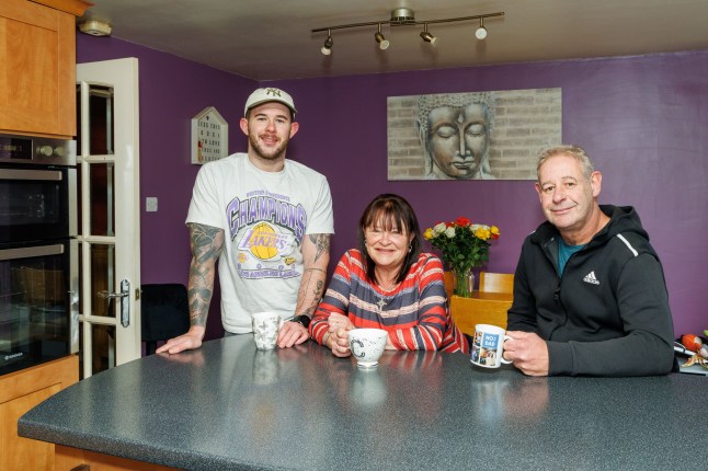 16/11/24 Conor Lindsay pictured with parents Carmel & Gary at home in Harviestoun Grove, Tillicoultry.