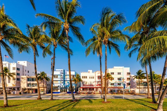 Multi-coloured vibrant art deco hotels along the Ocean Drive on a sunny day, in Miami Beach, Florida.