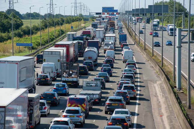 Lorries,cars,vans and coaches at a standstill.