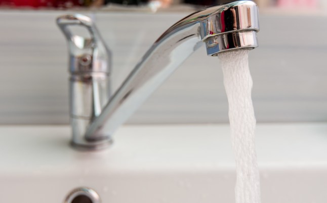 Water pours more pressure from the mixer in the bathroom