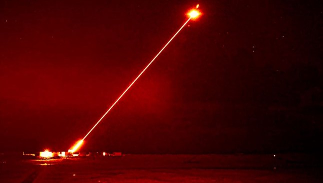 Advanced future military laser achieves UK first A military laser which could boost the UK Armed Forces with greater accuracy while reducing the reliance on high-cost ammunition has reached its next milestone. During a trial at the MOD?s Hebrides Range, the DragonFire laser directed energy weapon (LDEW) system achieved the UK?s first high-power firing of a laser weapon against aerial targets. The range of DragonFire is classified, but it is a line-of-sight weapon and can engage with any visible target. First high-power firing of a laser weapon against aerial targets Laser boasts pinpoint accuracy and low long-term costs Partnership with industry making positive progress for UK Armed Forces DragonFire exploits UK technology to be able to deliver a high power laser over long ranges. The precision required is equivalent to hitting a ?1 coin from a kilometre away. Laser-directed energy weapons can engage targets at the speed of light, and use an intense beam of light to cut through the target, leading to structural failure or more impactful results if the warhead is targeted. Firing it for 10 seconds is the cost equivalent of using a regular heater for just an hour. Therefore, it has the potential to be a long-term low-cost alternative to certain tasks missiles currently carry out. The cost of operating the laser is typically less than ?10 per shot.