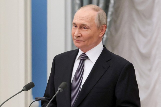In this pool photograph distributed by Russian state agency Sputnik, Russia's President Vladimir Putin gives a speech during a ceremony to present presidential prizes for young culture professionals, and for literature and art works for children and young people at the Kremlin in Moscow on March 25, 2025. (Photo by VYACHESLAV PROKOFYEV / POOL / AFP) (Photo by VYACHESLAV PROKOFYEV/POOL/AFP via Getty Images)