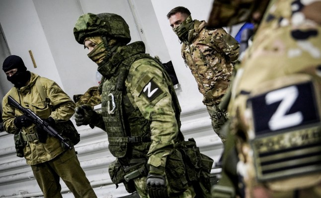 TOPSHOT - Volunteers have a military training in Rostov on December 6, 2022, amid the ongoing Russian military action in Ukraine. (Photo by STRINGER / AFP) (Photo by STRINGER/AFP via Getty Images)