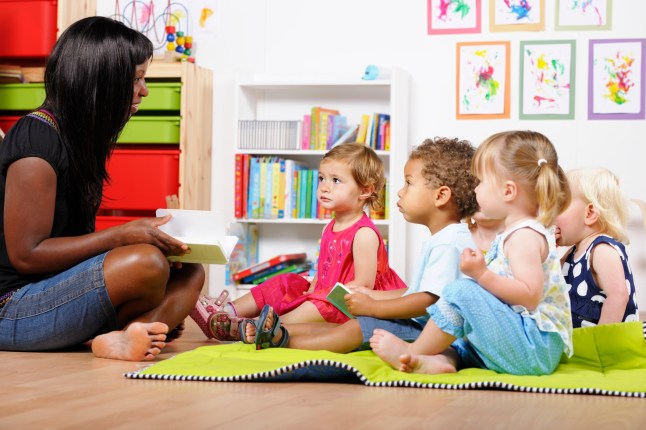 Young children with a carer or minder