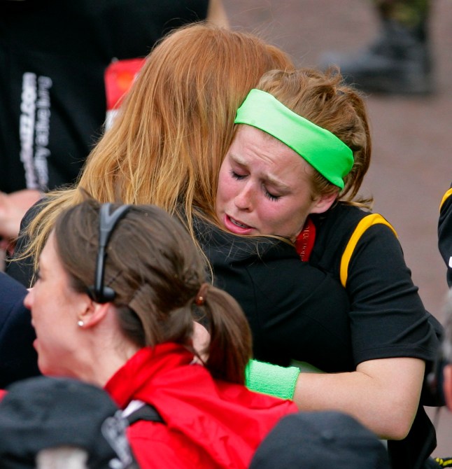 LONDON, UNITED KINGDOM - APRIL 25: (EMBARGOED FOR PUBLICATION IN UK NEWSPAPERS UNTIL 48 HOURS AFTER CREATE DATE AND TIME) An emotional looking HRH Princess Beatrice embraces her mother Sarah Ferguson, The Duchess of York after completing the Virgin London Marathon as part of the 'Caterpillar Run' Team, consisting of 32 runners tethered together on April 25, 2010 in London, England. (Photo by Indigo/Getty Images)