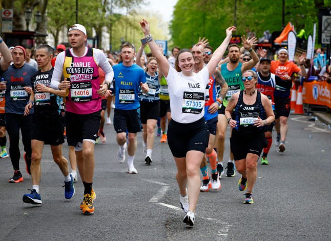 Athletics - London Marathon - London, Britain - April 21, 2024 Ellie Griffin and Charlie Muddyman in action during the marathon REUTERS/John Sibley