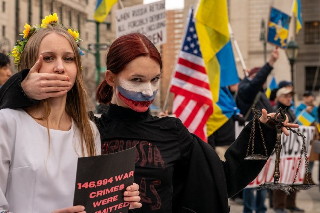 People attend a "Hold Russia Accountable Rally" in New York City, U.S., March 23, 2025. REUTERS/David Dee Delgado