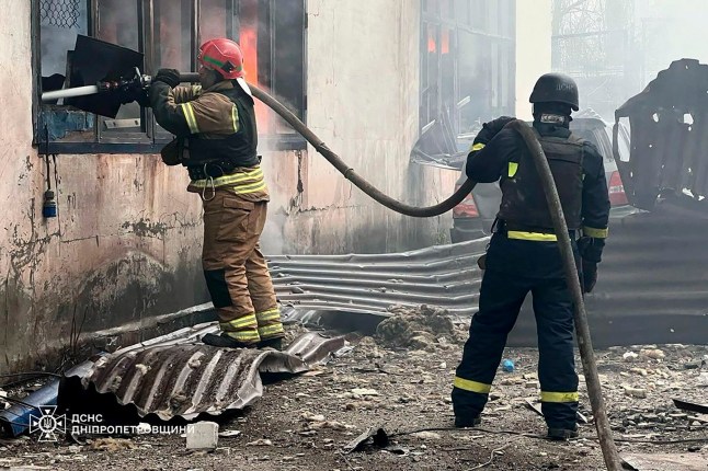 epa12005544 A handout photo released by the press service of the State Emergency Service (SES) of Ukraine shows Ukrainian rescuers working at the site of a rocket strike in Kryvyi Rih, central Ukraine, 02 April 2025, amid the Russian invasion. At least four people have been killed and 14 others injured after Russian shelling hit Kryvyi Rih, the Dnipropetrovsk Regional Military Administration reported. EPA/STATE EMERGENCY SERVICE OF UKRAINE HANDOUT -- BEST QUALITY AVAILABLE -- MANDATORY CREDIT: STATE EMERGENCY SERVICE OF UKRAINE -- HANDOUT EDITORIAL USE ONLY/NO SALES