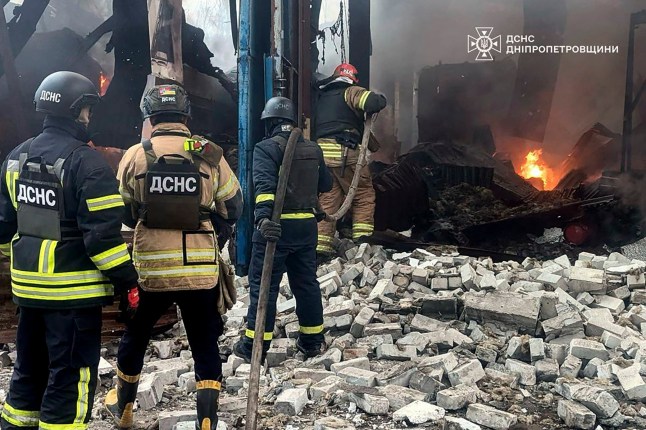 epa12005549 A handout photo released by the press service of the State Emergency Service (SES) of Ukraine shows Ukrainian rescuers working at the site of a rocket strike in Kryvyi Rih, central Ukraine, 02 April 2025, amid the Russian invasion. At least four people have been killed and 14 others injured after Russian shelling hit Kryvyi Rih, the Dnipropetrovsk Regional Military Administration reported. EPA/STATE EMERGENCY SERVICE OF UKRAINE HANDOUT -- BEST QUALITY AVAILABLE -- MANDATORY CREDIT: STATE EMERGENCY SERVICE OF UKRAINE -- HANDOUT EDITORIAL USE ONLY/NO SALES