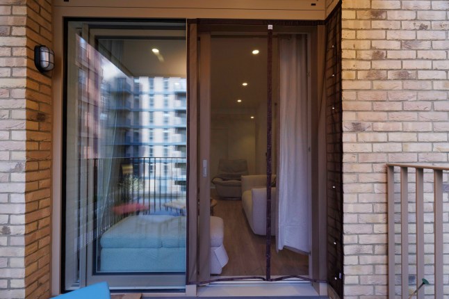 What I Own - Poplar. Nitish Kumar. Pictured: balcony. Image shot on 4th April 2025. ?? Belinda Jiao jiao.bilin@gmail.com 07598931257 https://www.belindajiao.com/about