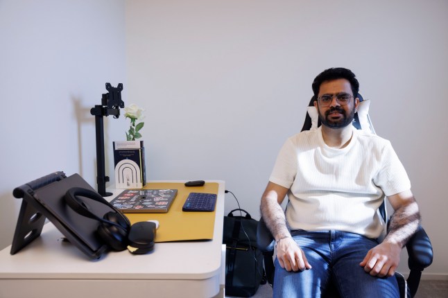 What I Own - Poplar. Nitish Kumar. Pictured: Nitish in the guest bedroom/ office. Image shot on 4th April 2025. ?? Belinda Jiao jiao.bilin@gmail.com 07598931257 https://www.belindajiao.com/about