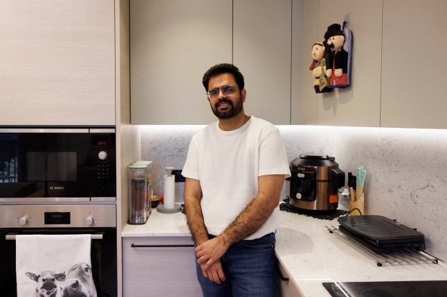 What I Own - Poplar. Nitish Kumar. Pictured: Nitish in the kitchen. Image shot on 4th April 2025. ?? Belinda Jiao jiao.bilin@gmail.com 07598931257 https://www.belindajiao.com/about