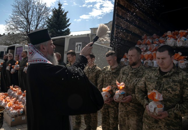 Ukrainian soldiers receiving Easter gifts and cakes on the frontline of the Russia-Ukraine war.