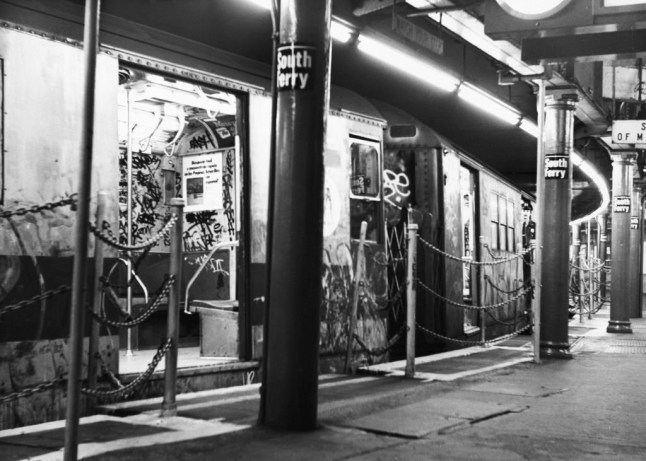 A graffiti-covered NYC Subway train, its doors open at South Ferry Subway station in the Financial District of Lower Manhattan in New York City, New York, 1983. (Photo by Peter Keegan/Keystone/Hulton Archive/Getty Images)